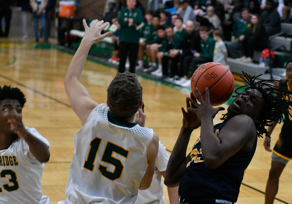 Battle junior forward Anthony Thrower looses control of the ball